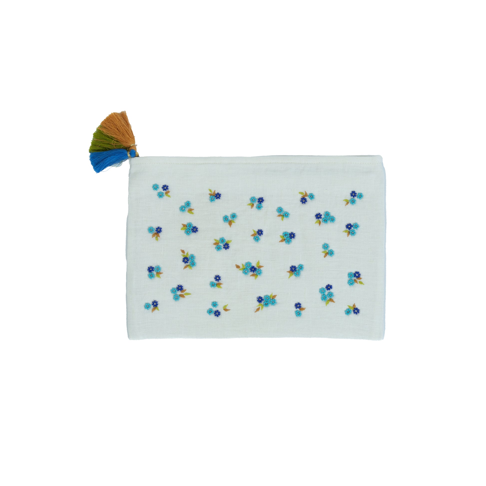 A handwoven pouch made of undyed Egyptian linen with blue floral patterns and a multicolored tassel on the side.
