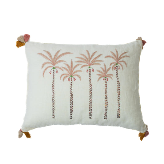 Rectangular ecru cushion cover with hand embroidered palm trees and tassels on the corners.